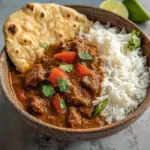 beef and coconut curry slow cooker served hot
