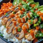 Bang Bang Chicken Bowl: A Flavor Explosion for Beginner Cooks 8 Bang Bang Chicken Bowl with tender chicken, crisp cabbage, cucumber, avocado, and creamy sauce in a white ceramic bowl.