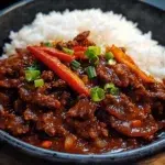 Ultimate Hearty Beef Chili & Rice 2025 | Easy & Flavorful 8 Bowl of Ultimate Hearty Beef Chili & Rice with cilantro and lime garnish