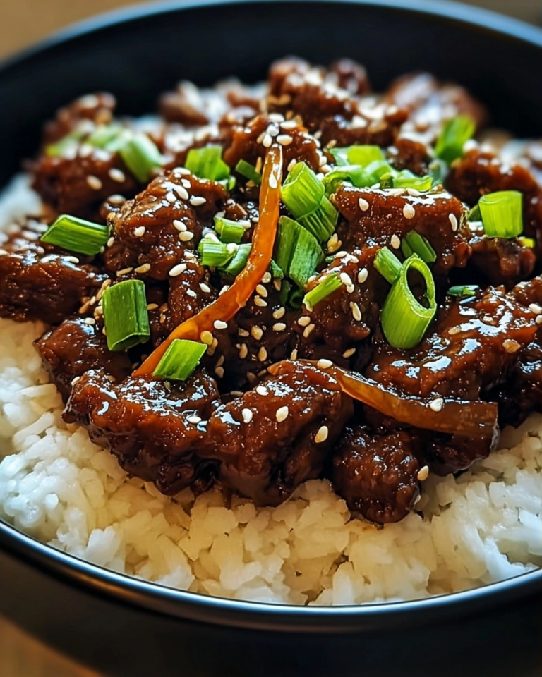 Sticky Garlic Mongolian Beef with Caramelized Onions and Sesame Glaze